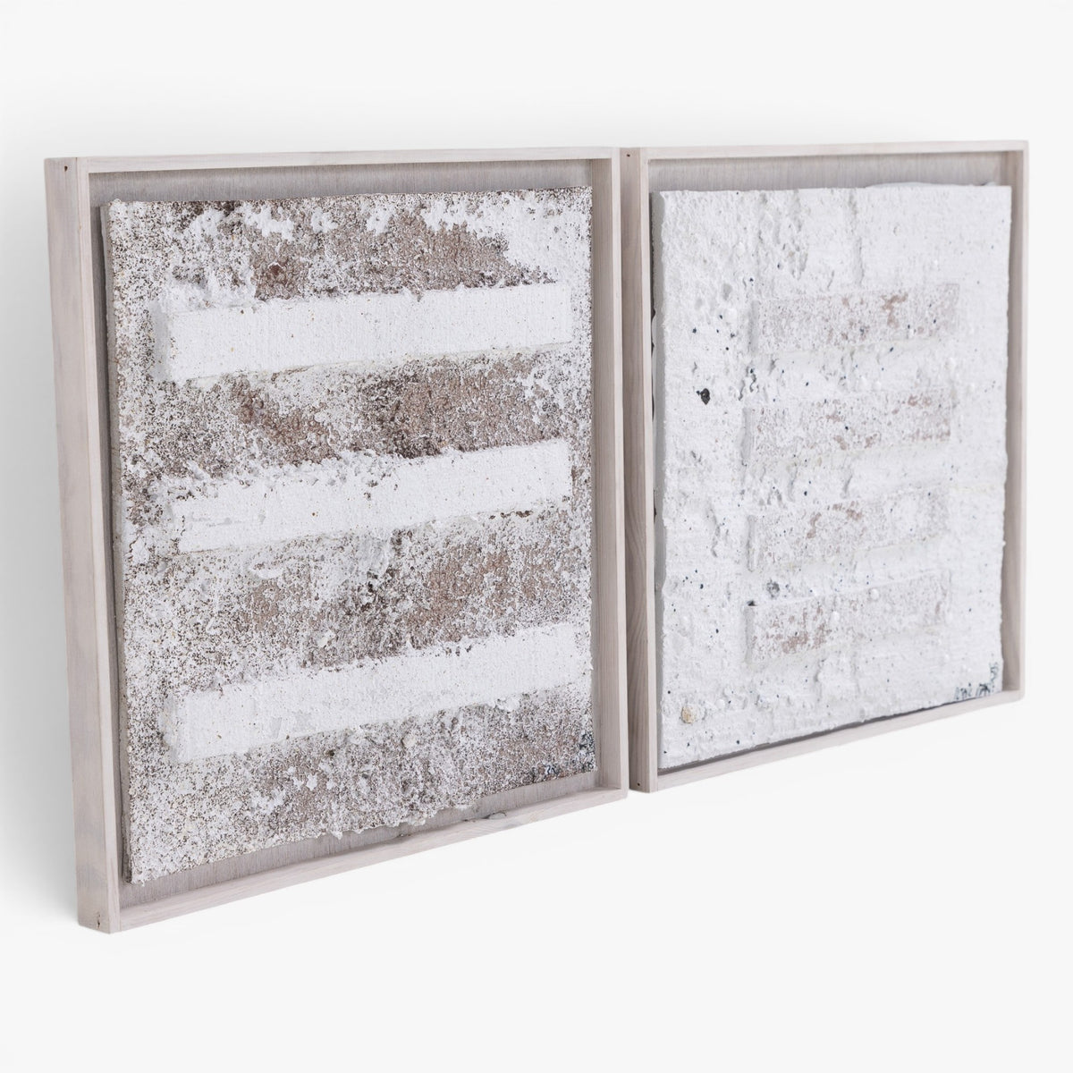 Pair of reliefs in wooden frame