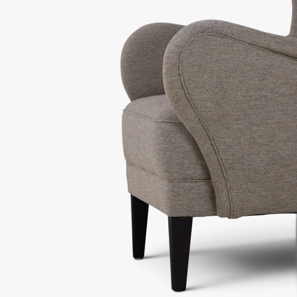 Reupholstered easy chair in textile