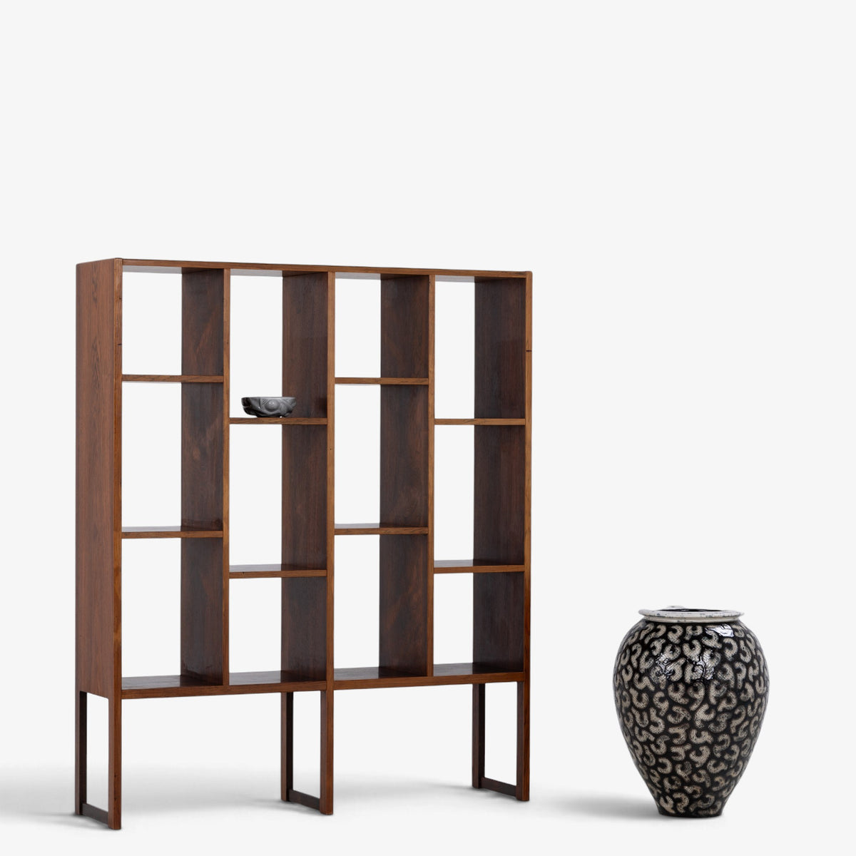 Freestanding shelving unit in rosewood
