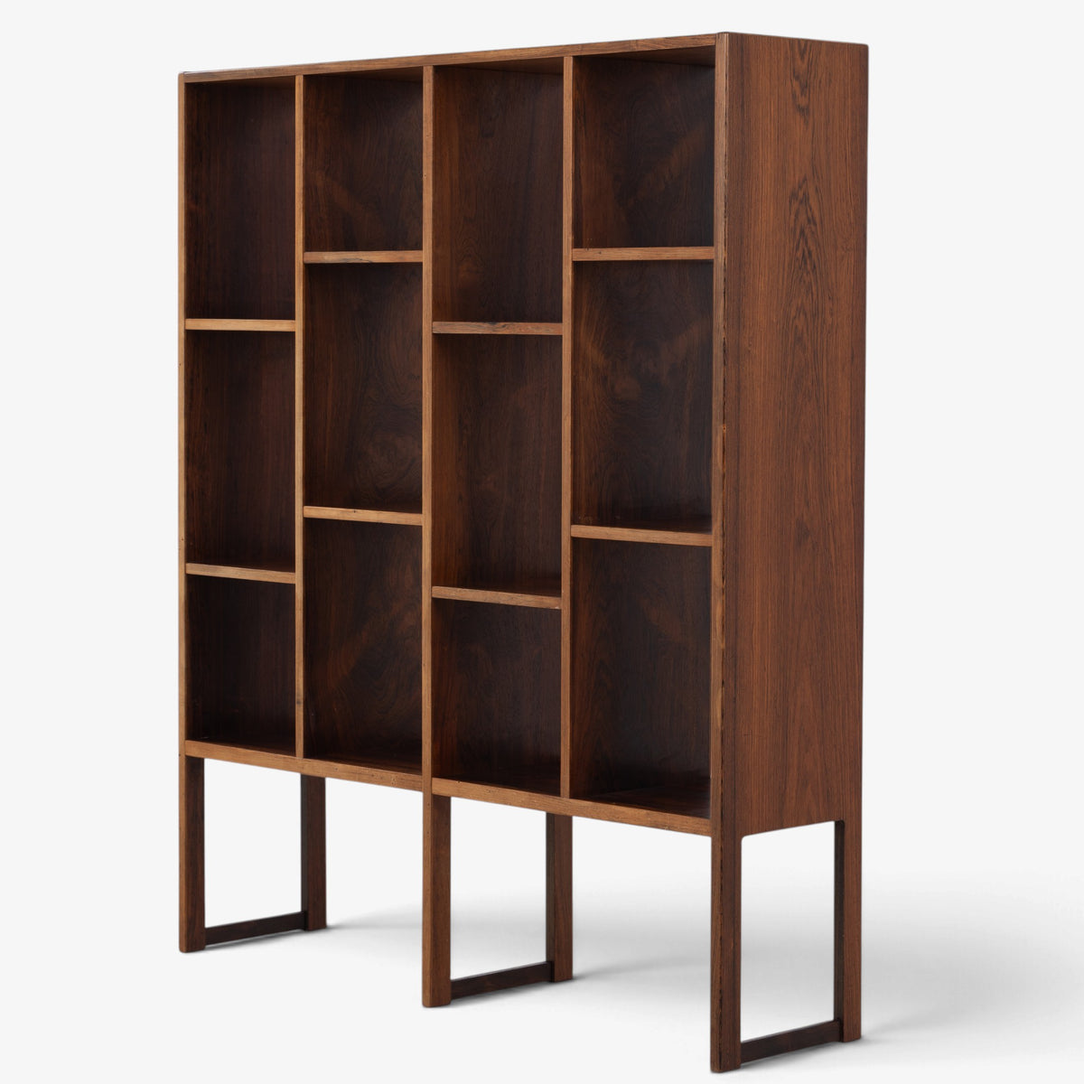 Freestanding shelving unit in rosewood