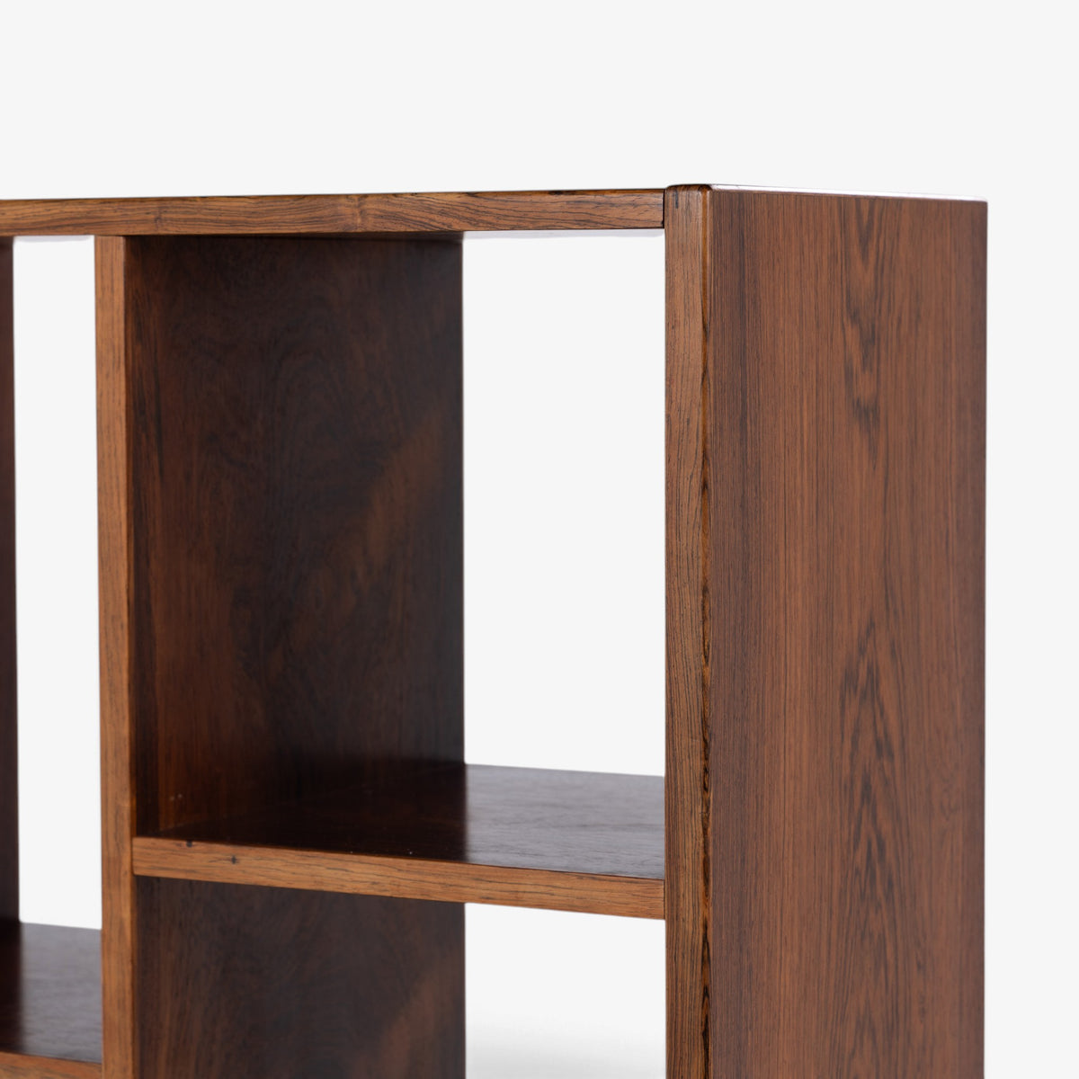 Freestanding shelving unit in rosewood