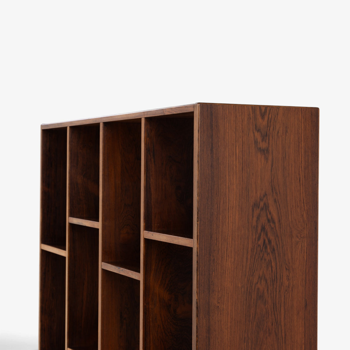 Freestanding shelving unit in rosewood