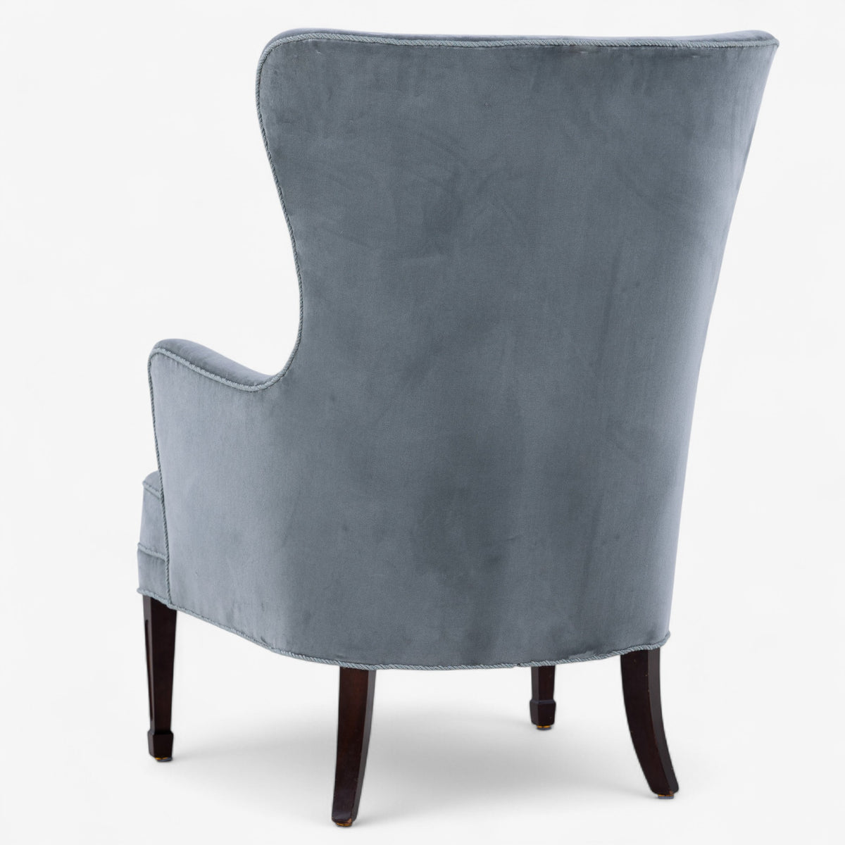 High-backed easy chair in textile