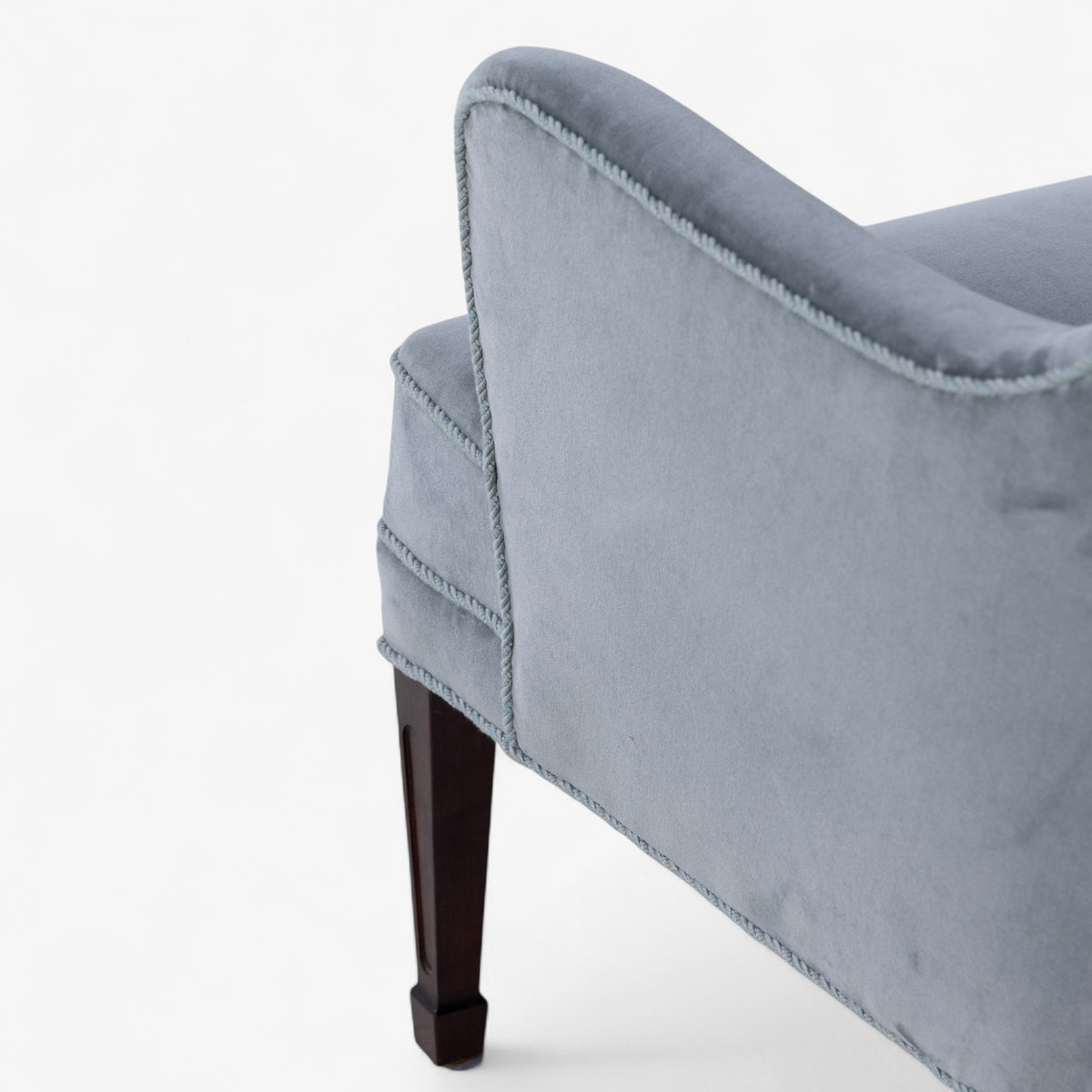 High-backed easy chair in textile