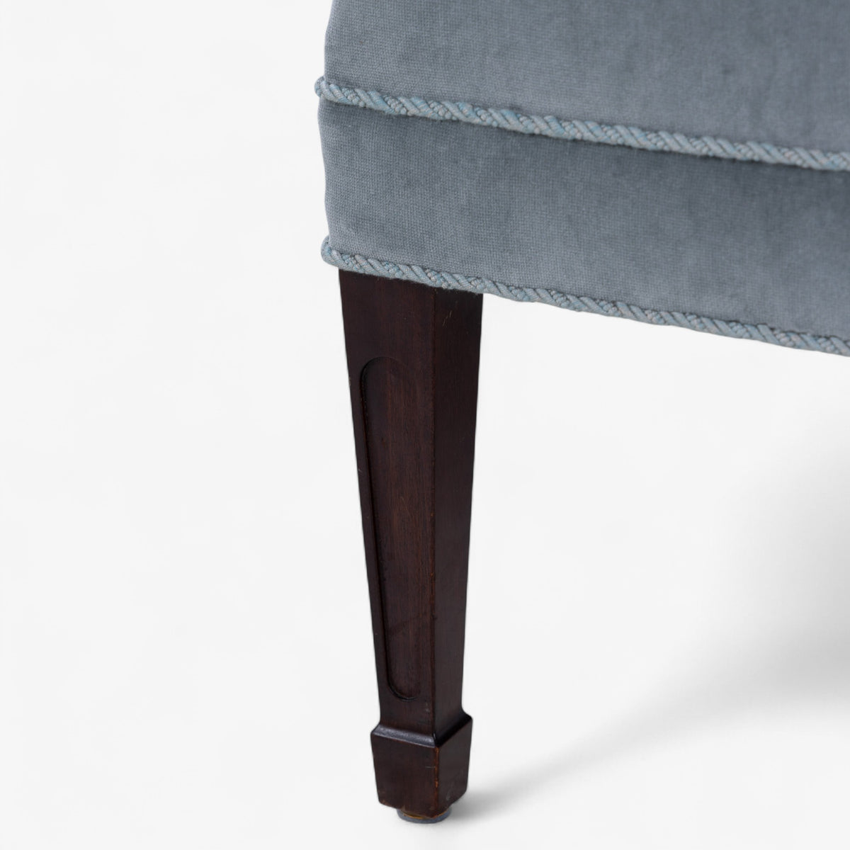High-backed easy chair in textile