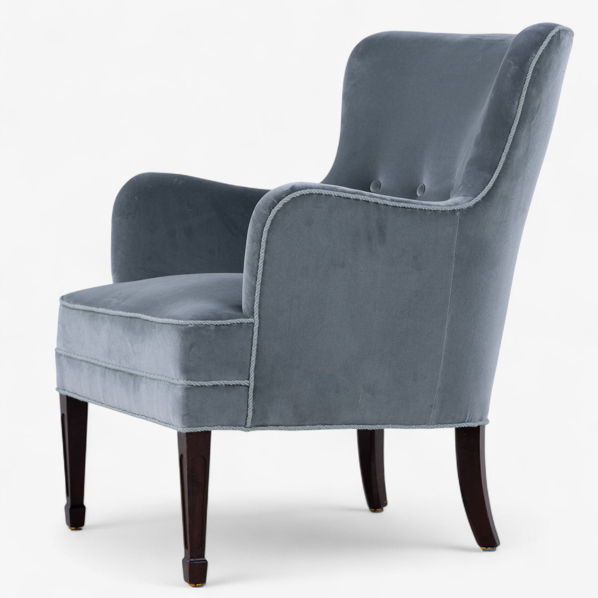Low-backed easy chair in textile