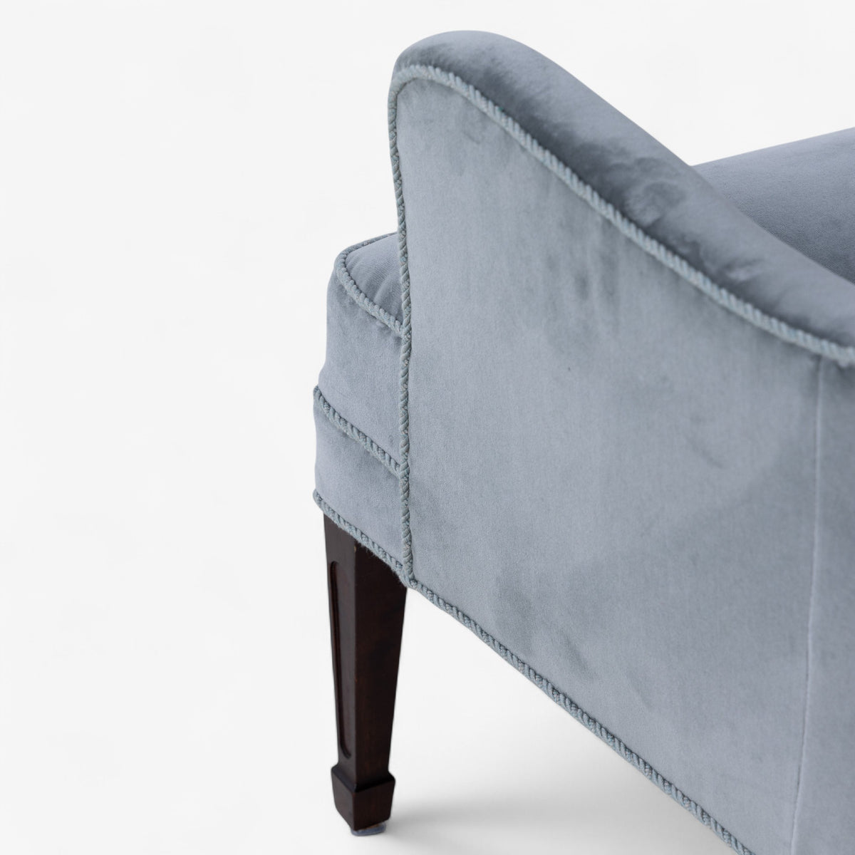Low-backed easy chair in textile