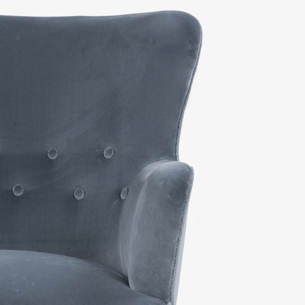 Low-backed easy chair in textile