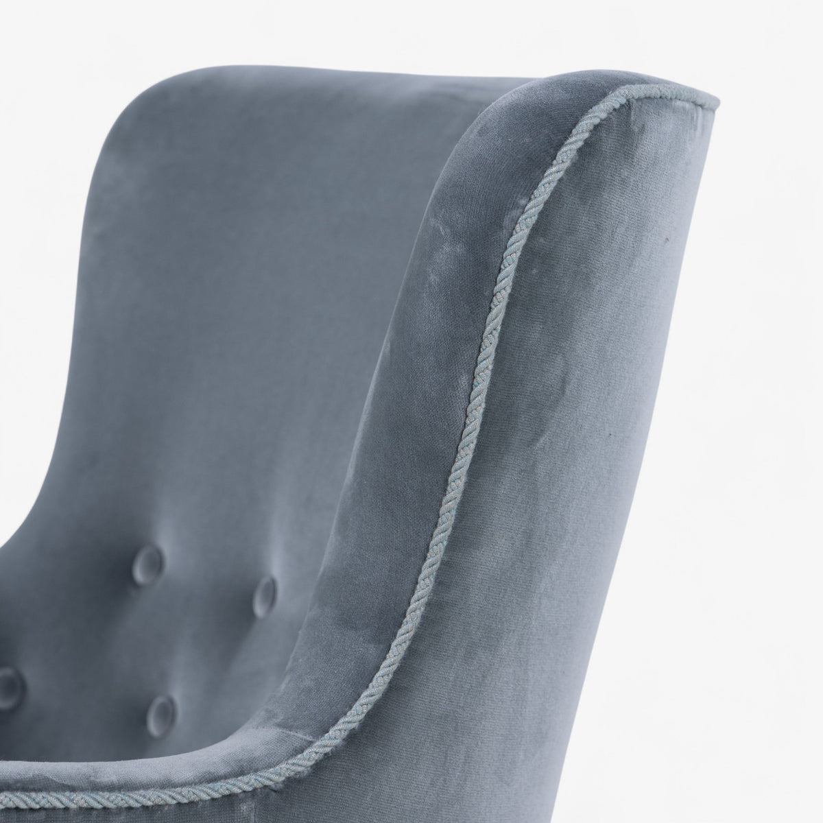 Low-backed easy chair in textile