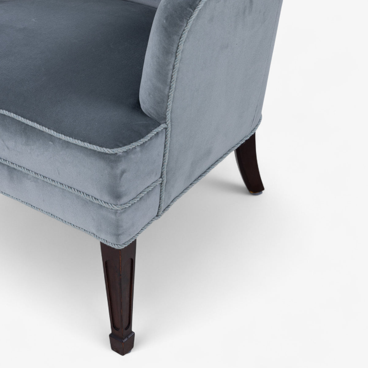 Low-backed easy chair in textile