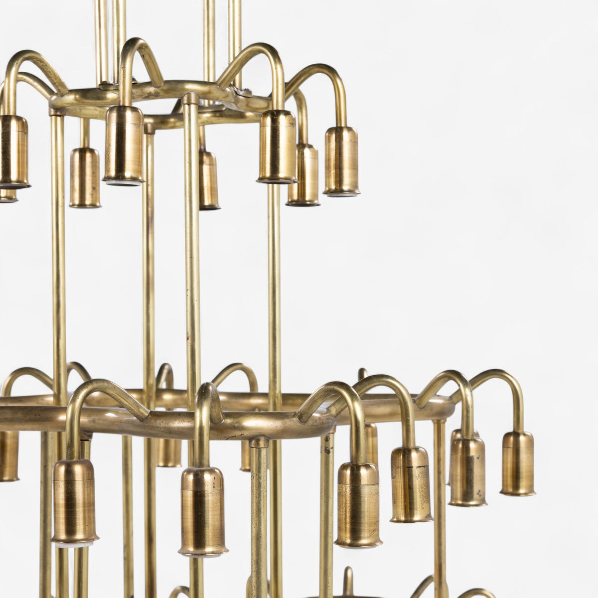 Large chandelier in patinated brass