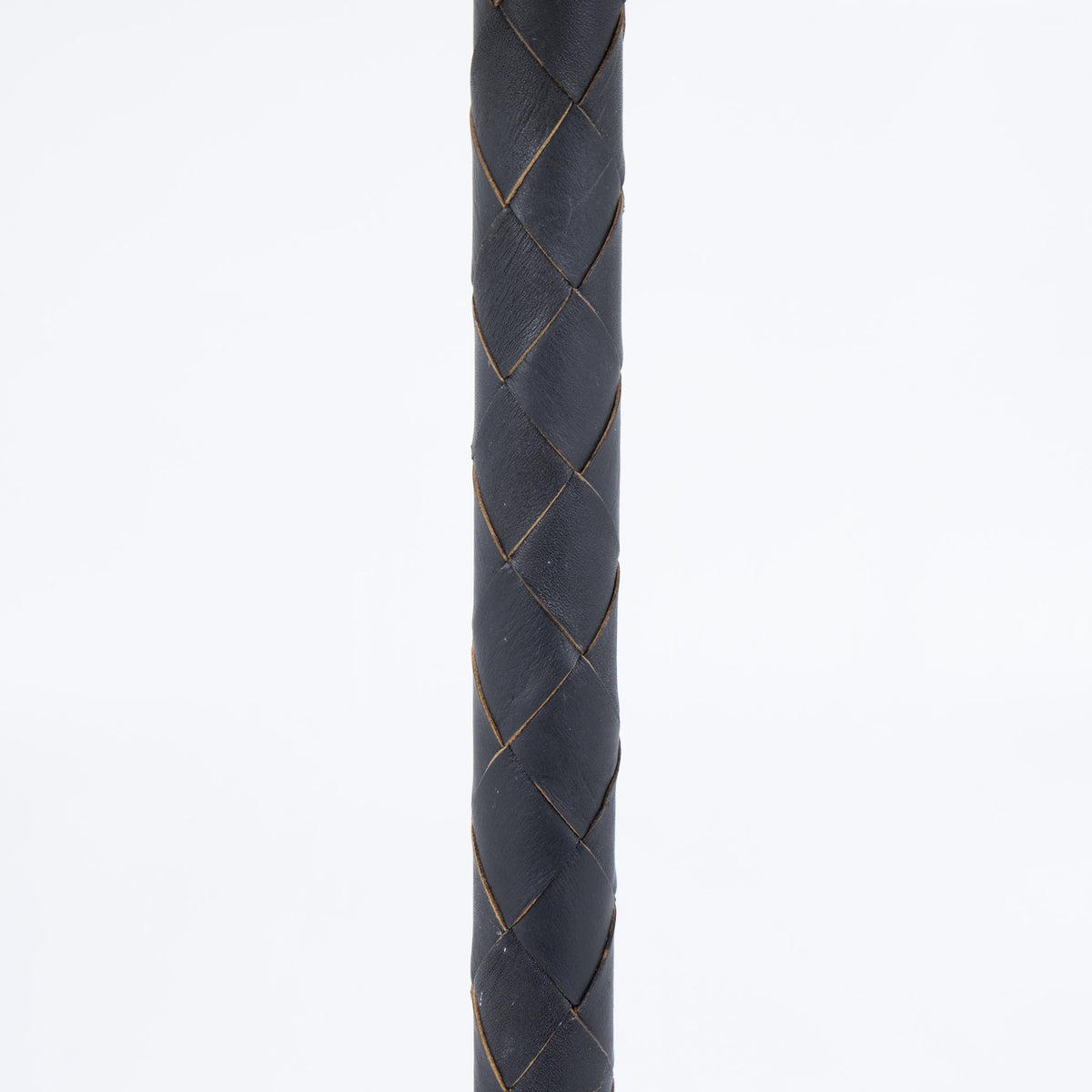 Floor lamp in braided leather