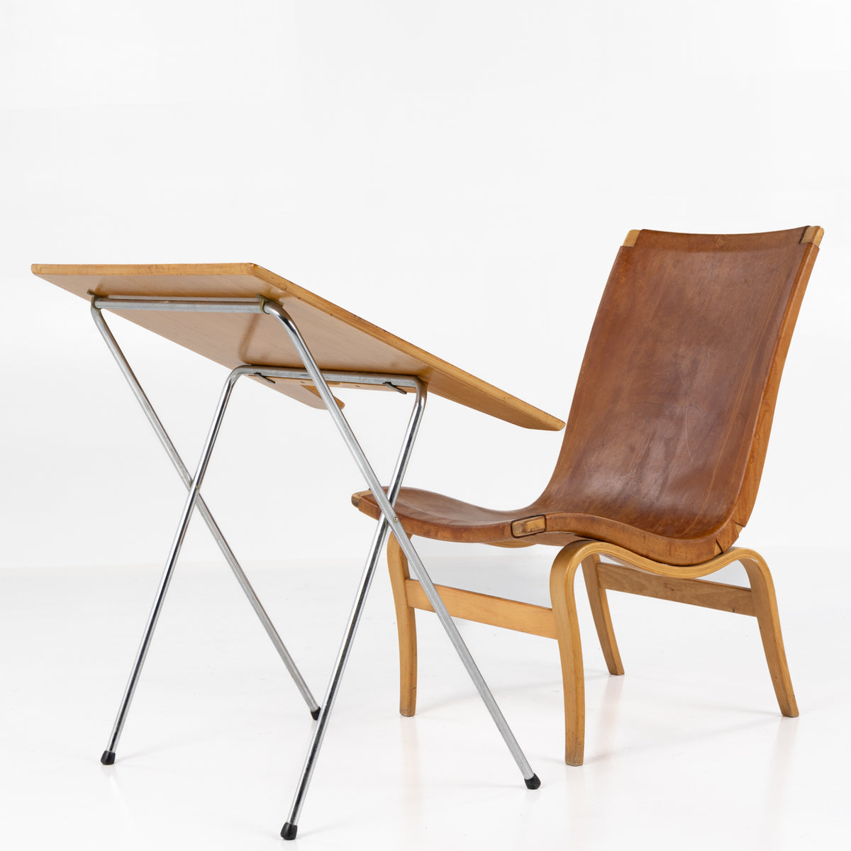 Easy chair with reading flap
