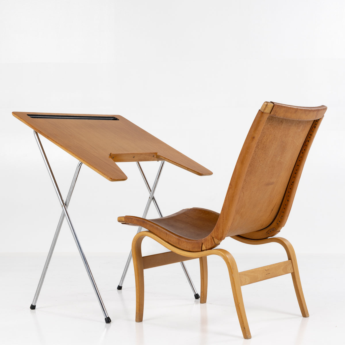 Easy chair with reading flap