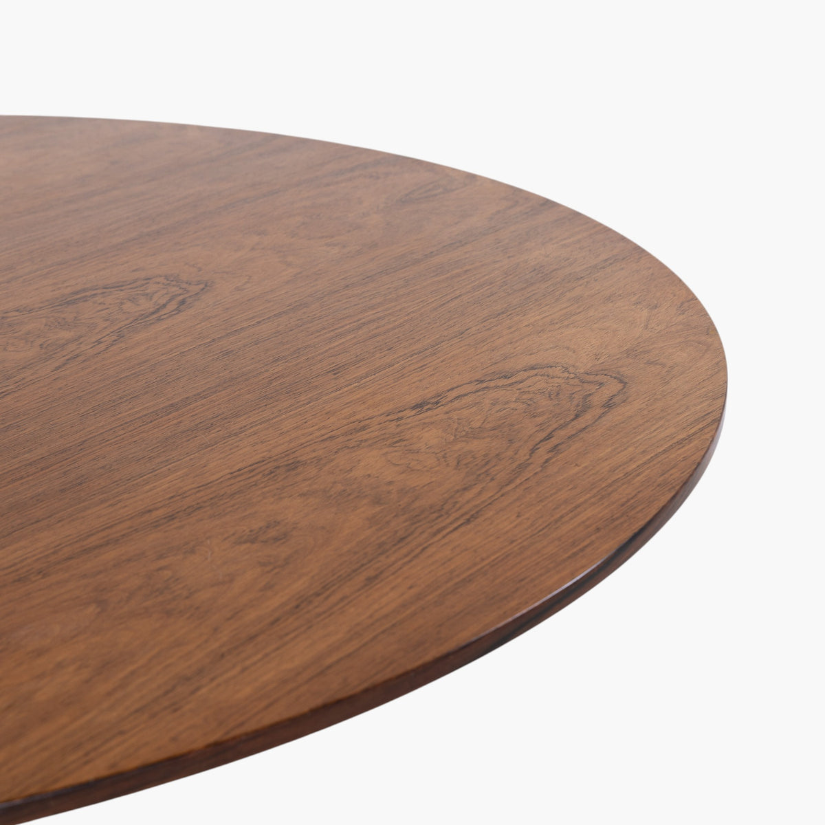Round dining table in rosewood