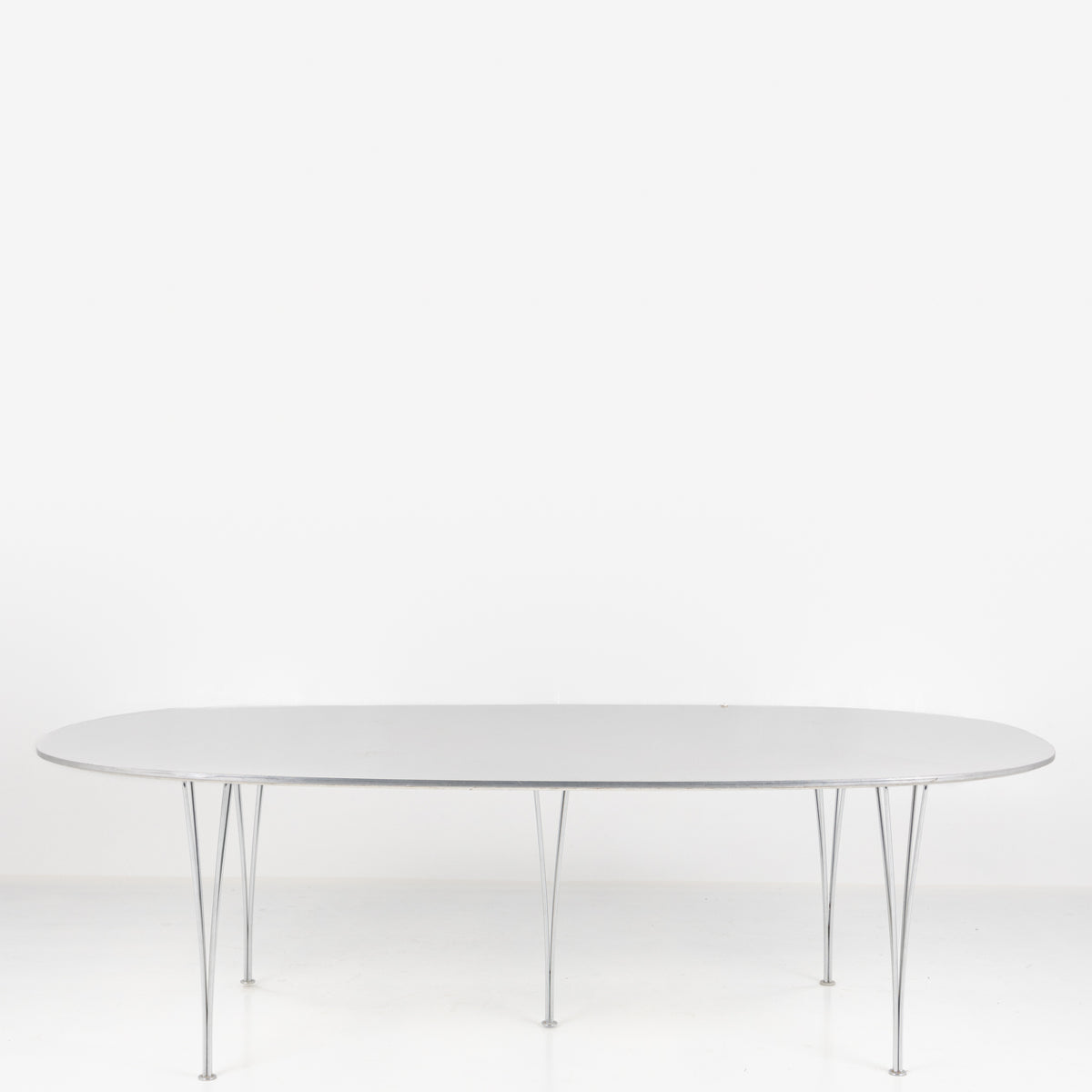 Superellipse dining table in white laminate