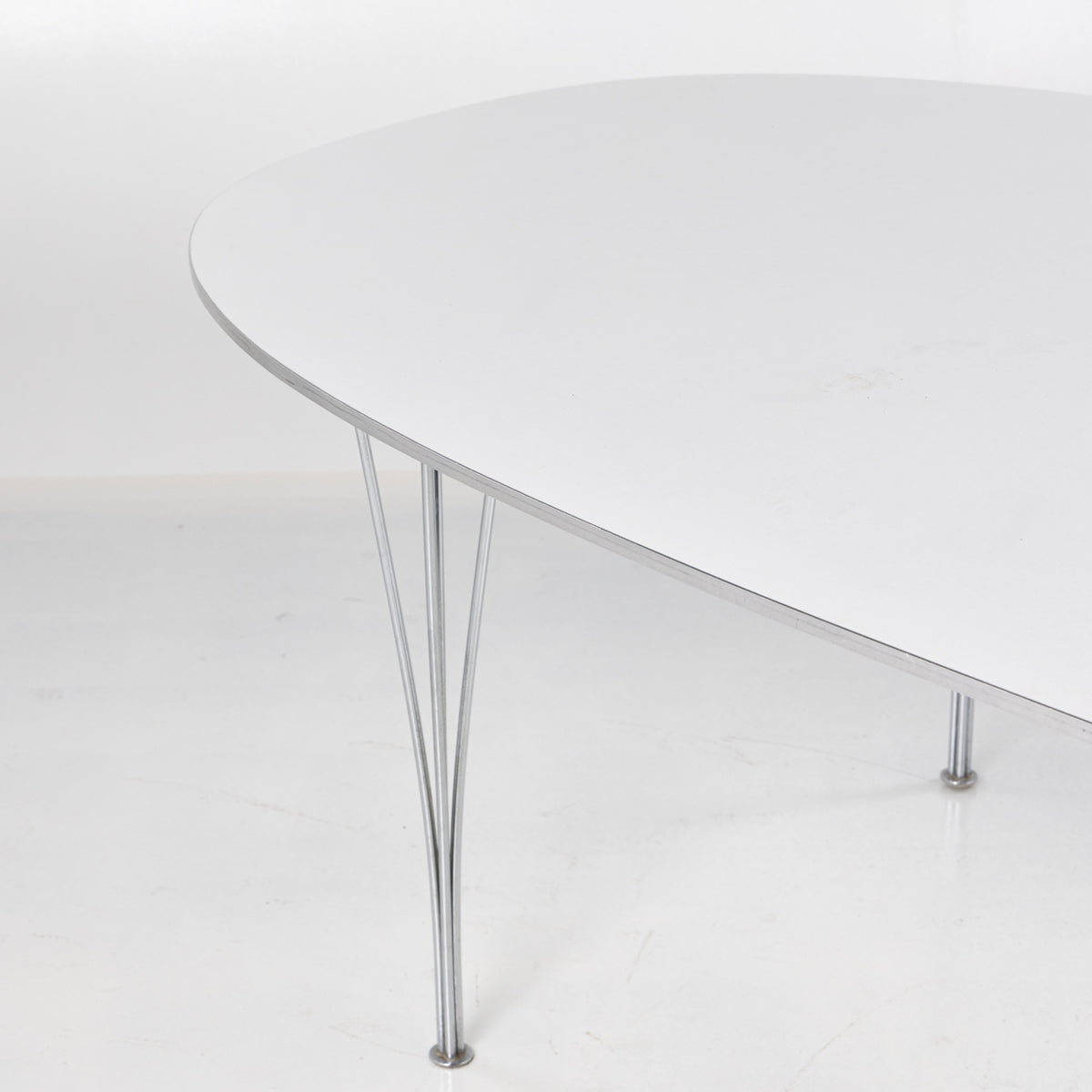 Superellipse dining table in white laminate