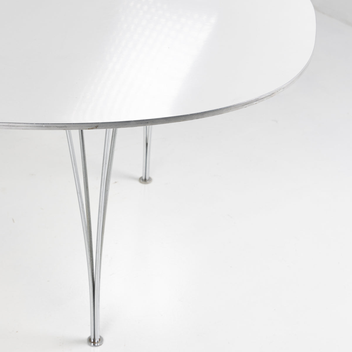 Superellipse dining table in white laminate