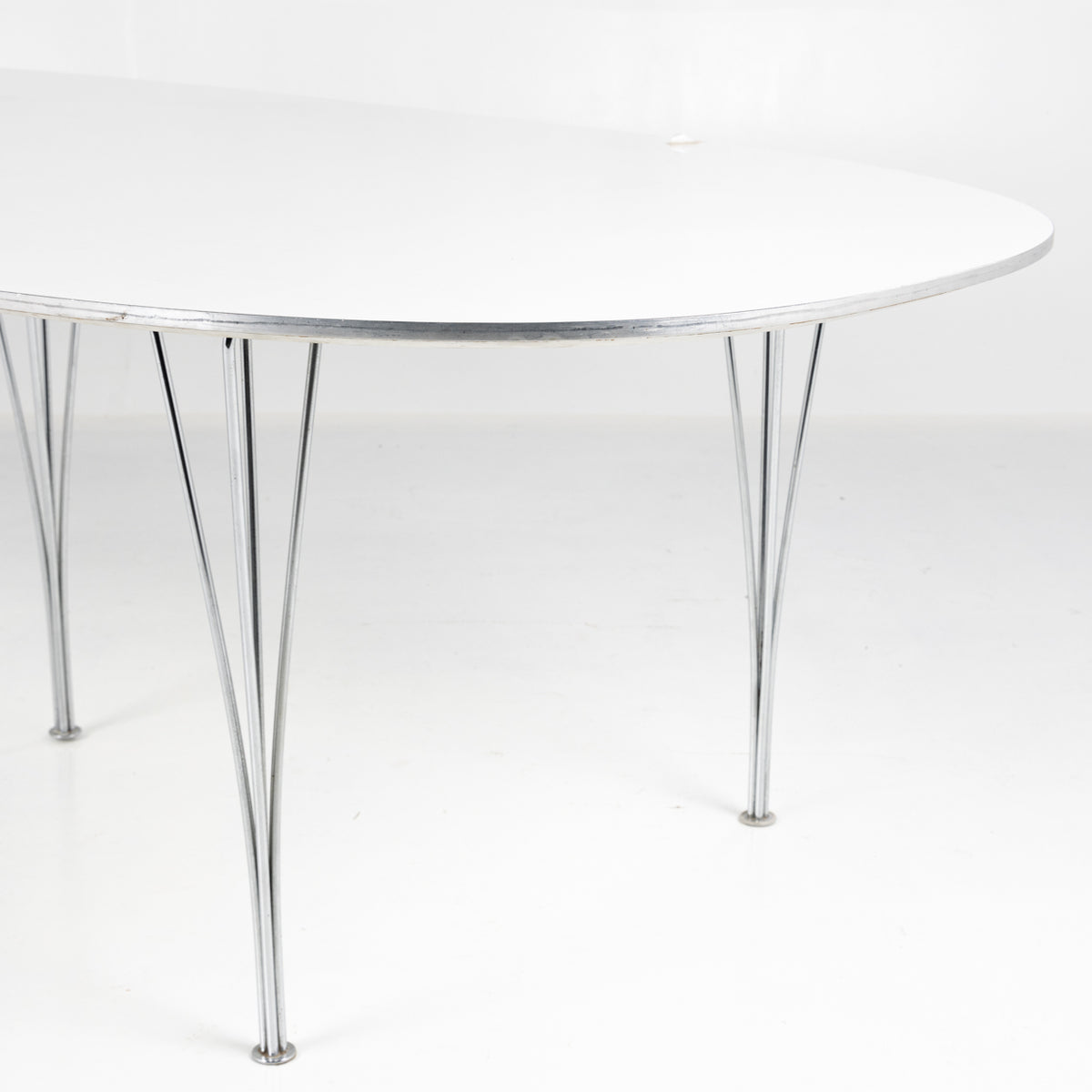 Superellipse dining table in white laminate