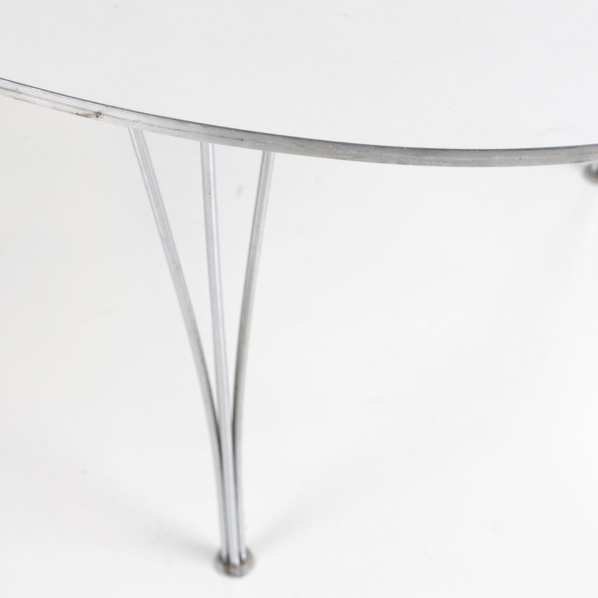Superellipse dining table in white laminate