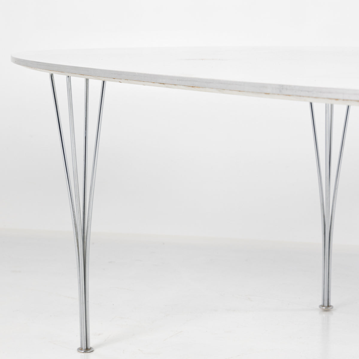 Superellipse dining table in white laminate