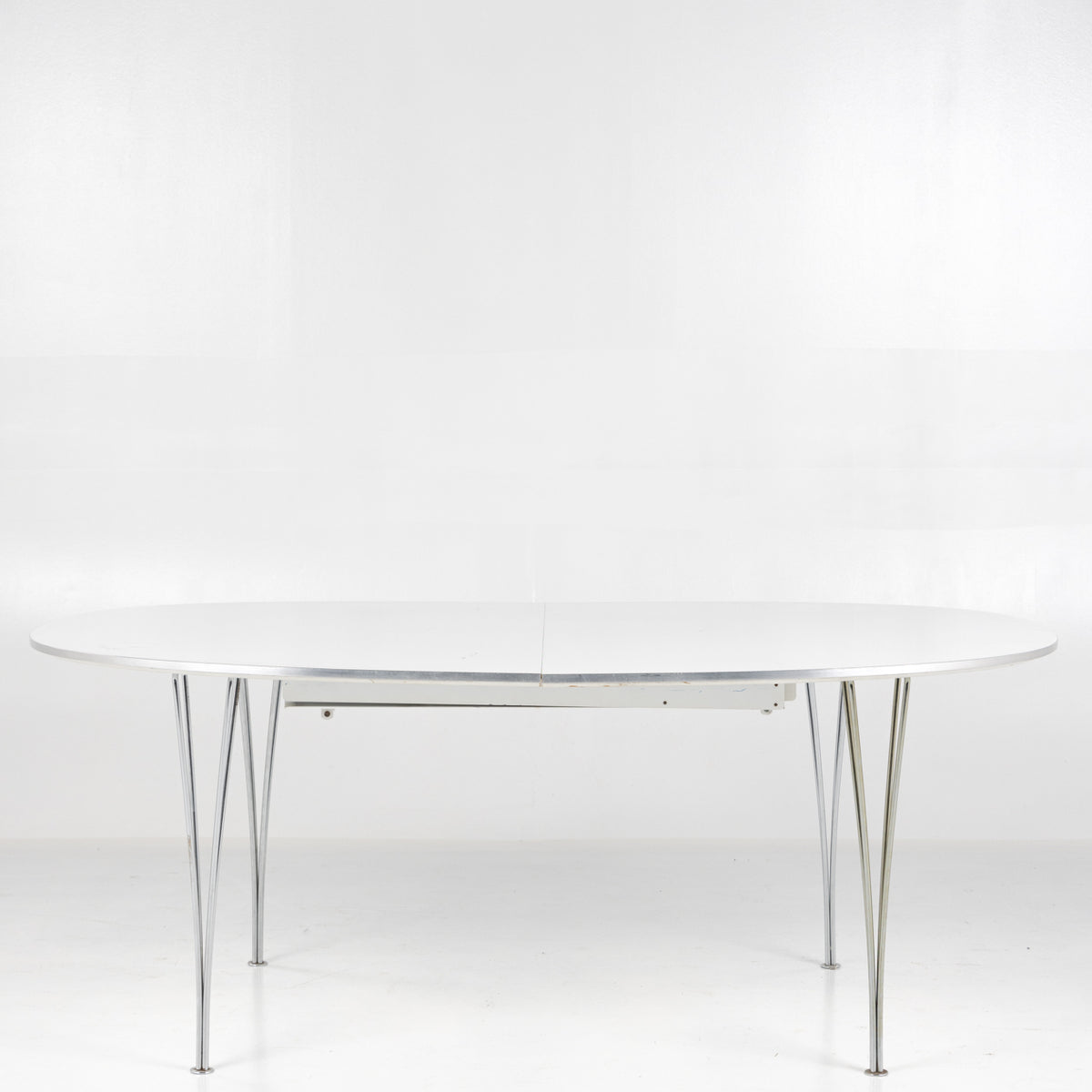 Superellipse dining table in white laminate