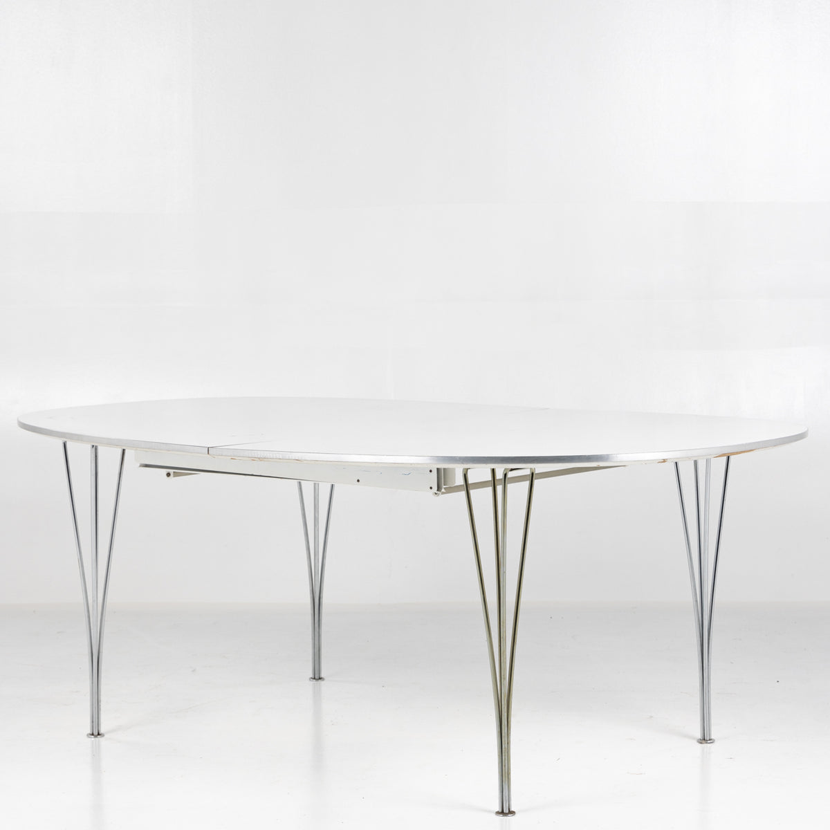 Superellipse dining table in white laminate
