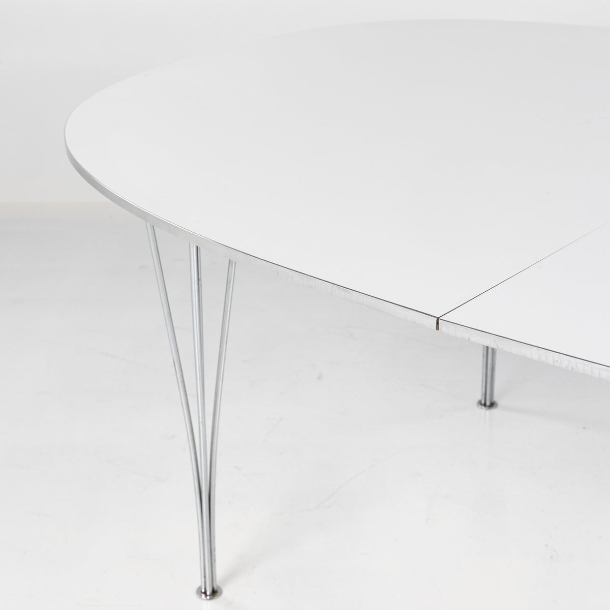 Superellipse dining table in white laminate