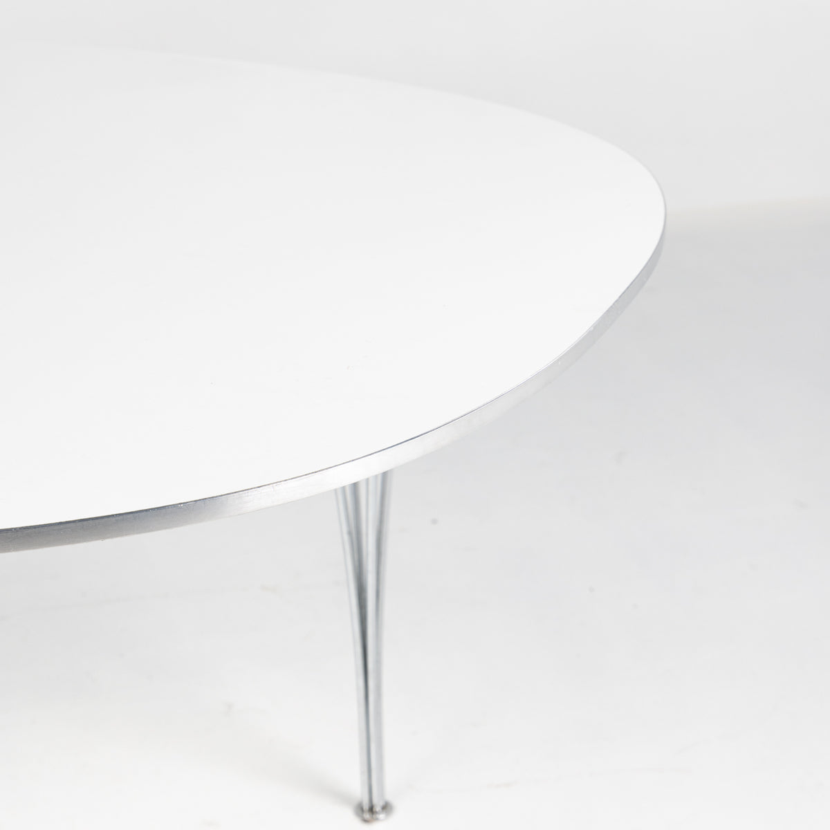 Superellipse dining table in white laminate