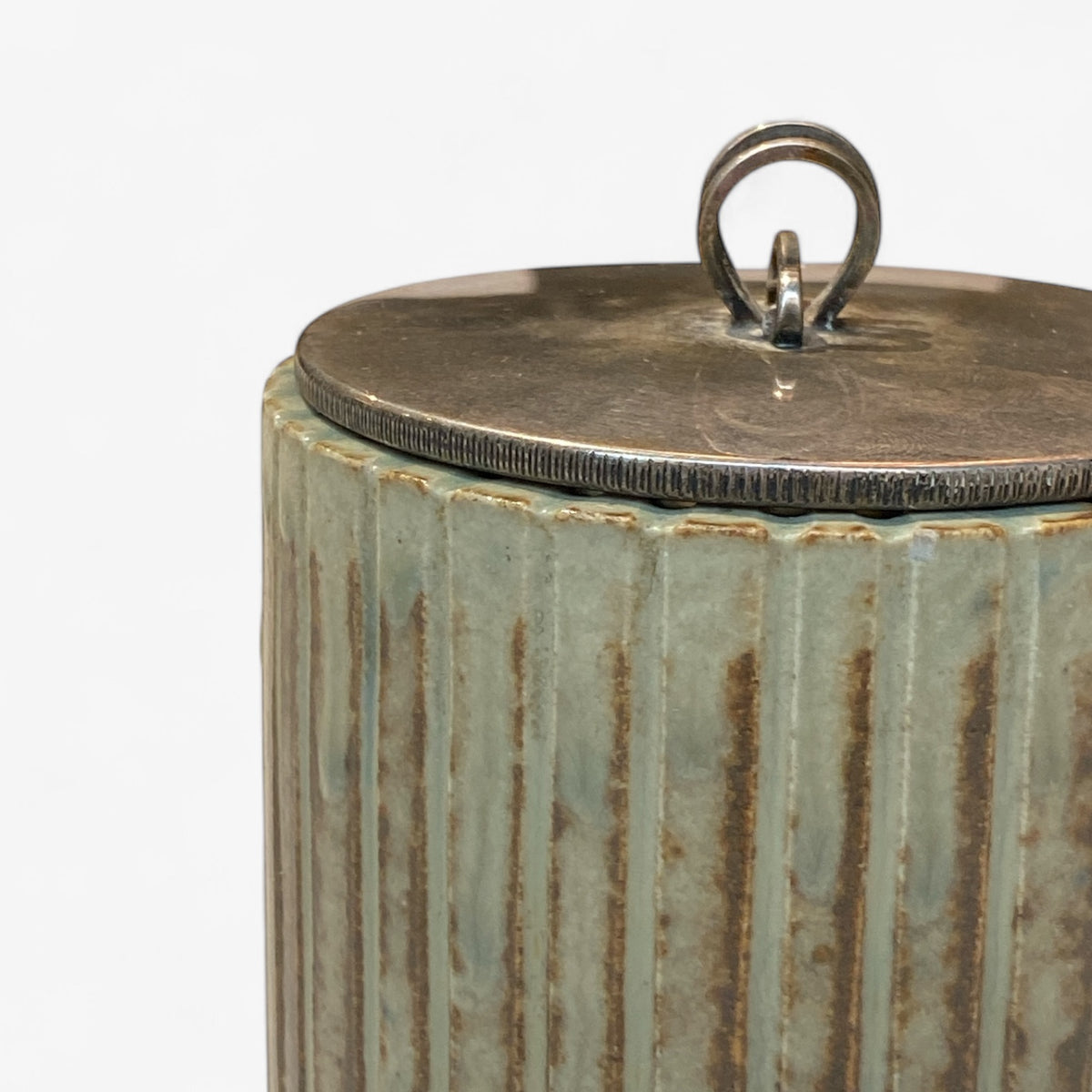 Lidded jar in fluted stoneware