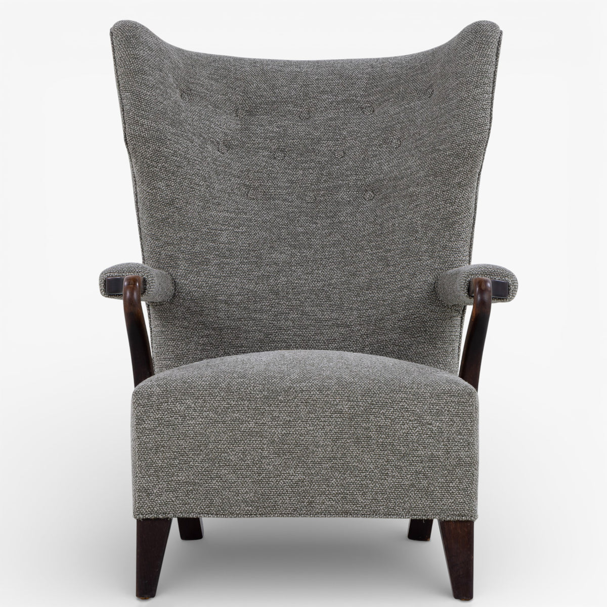 High-backed easy chair in new textile