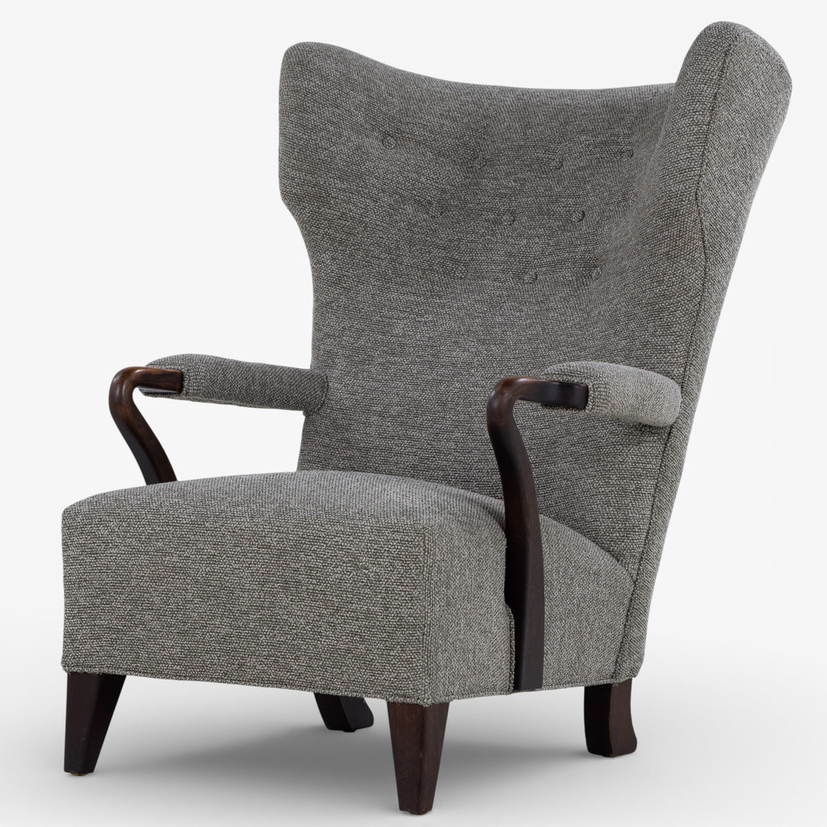 High-backed easy chair in new textile