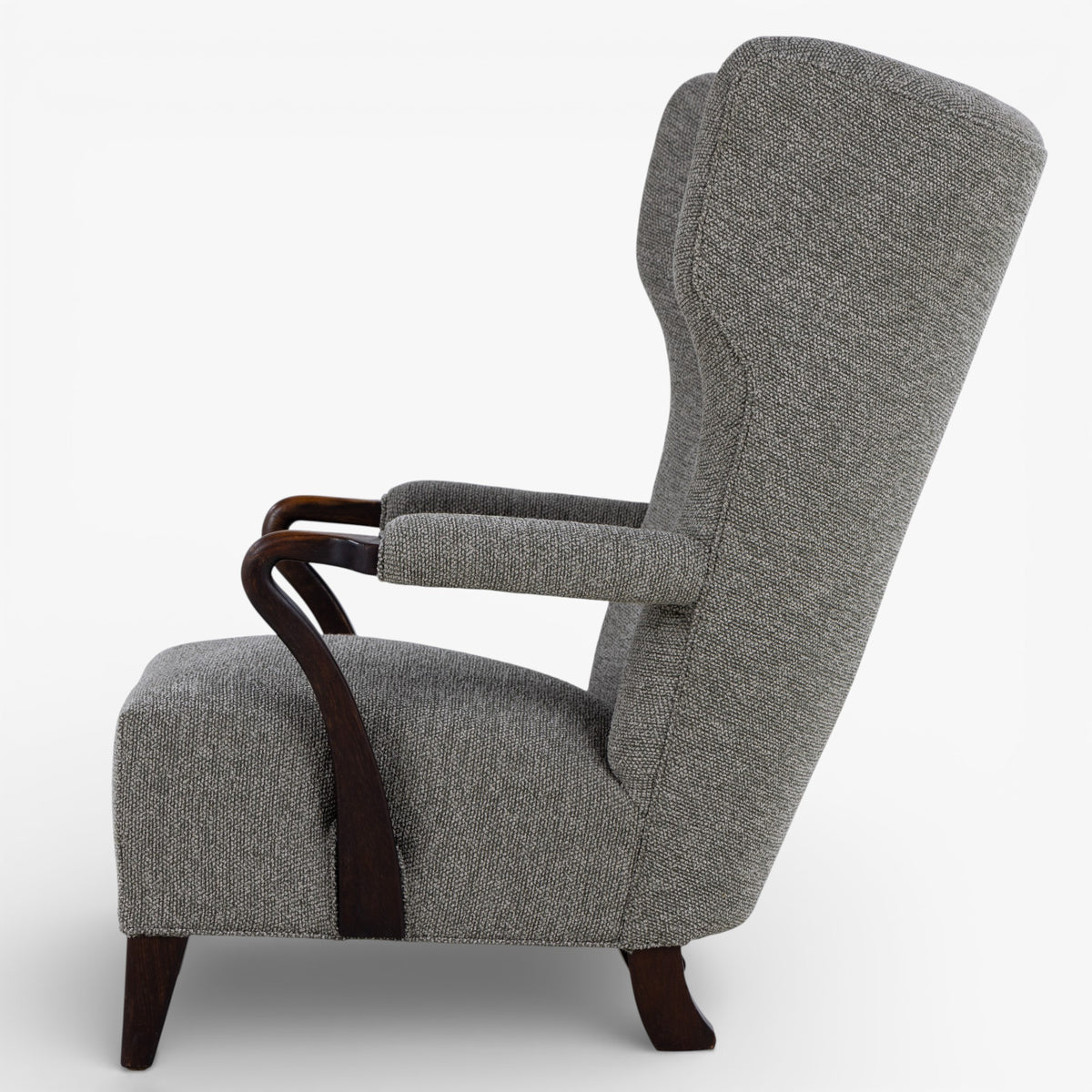 High-backed easy chair in new textile