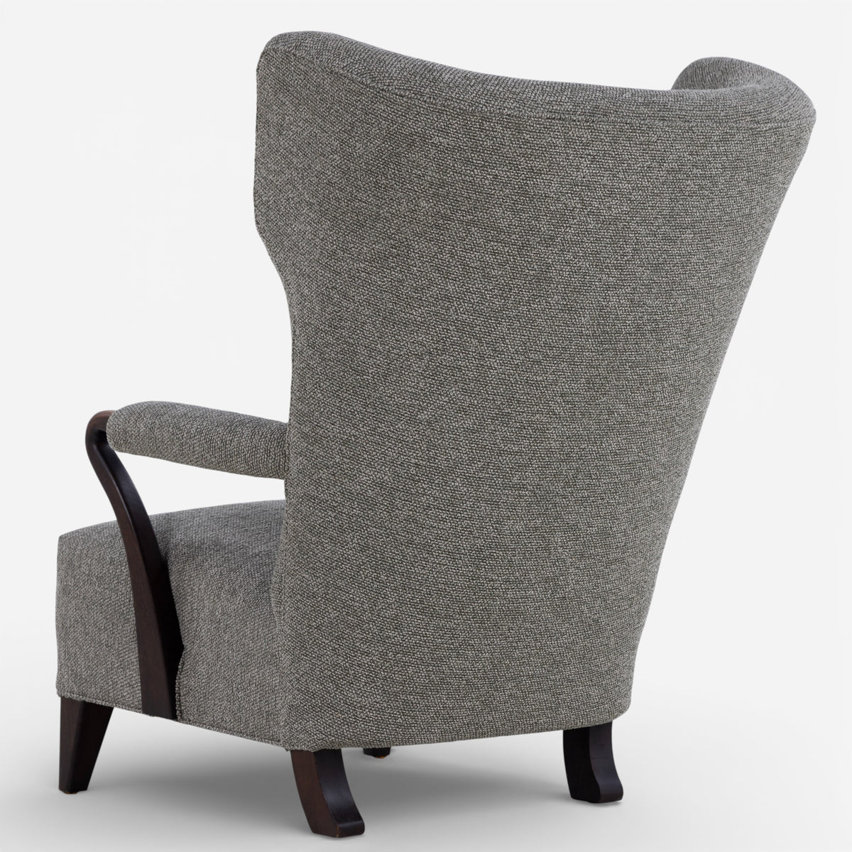 High-backed easy chair in new textile