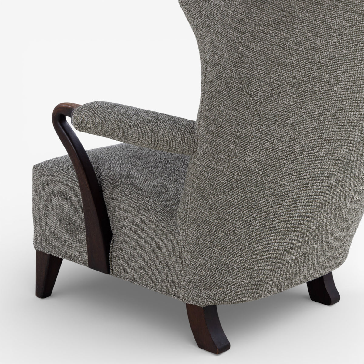 High-backed easy chair in new textile