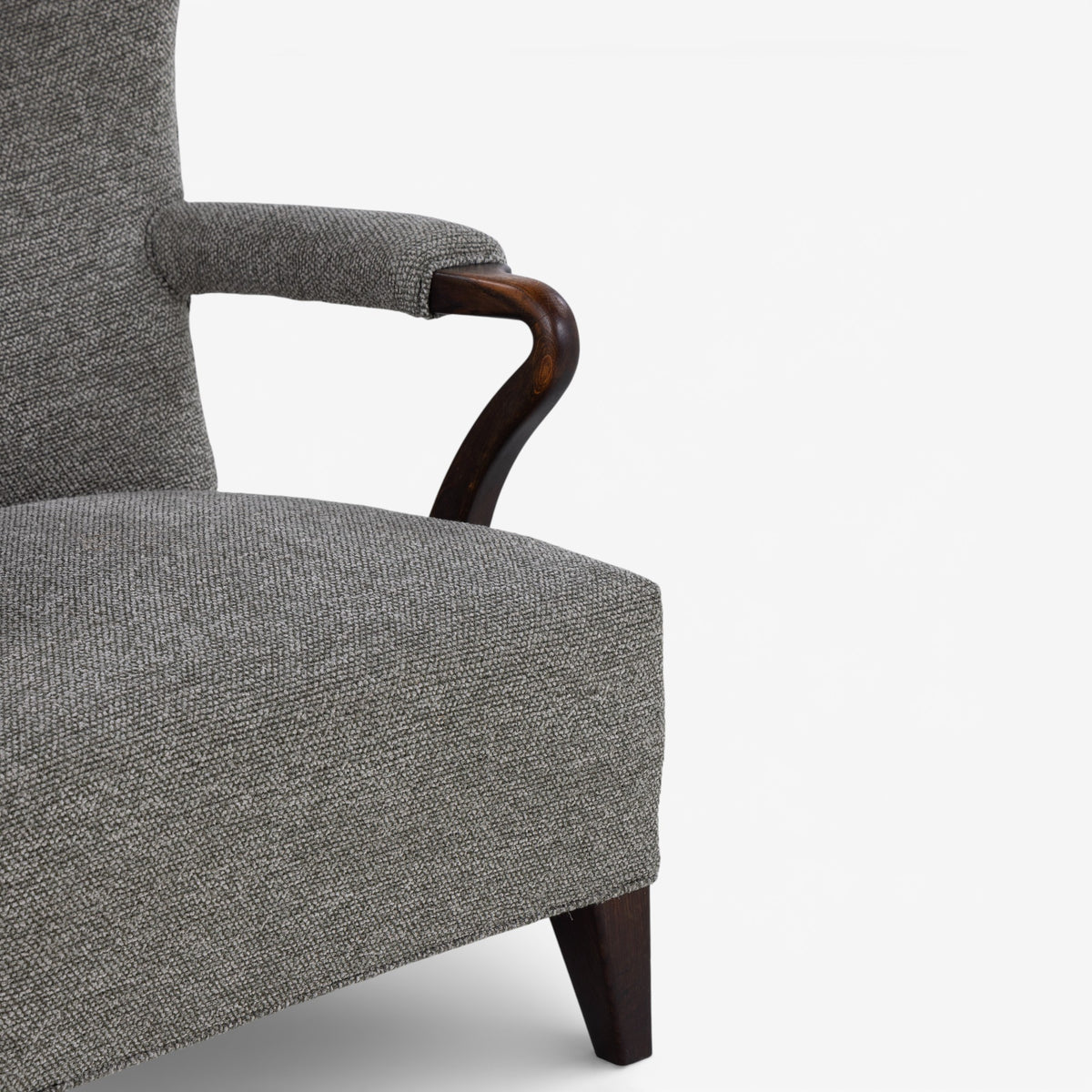 High-backed easy chair in new textile