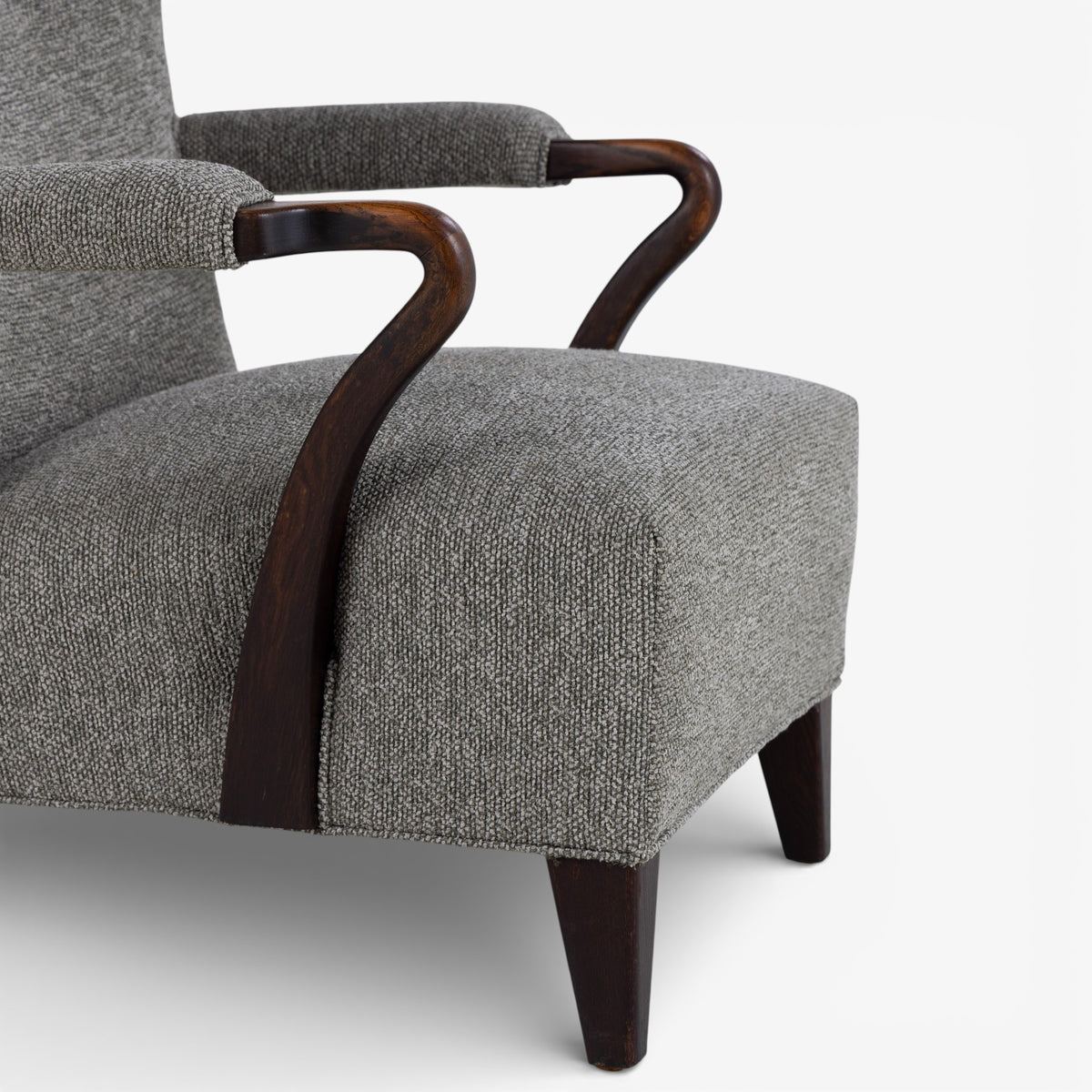 High-backed easy chair in new textile