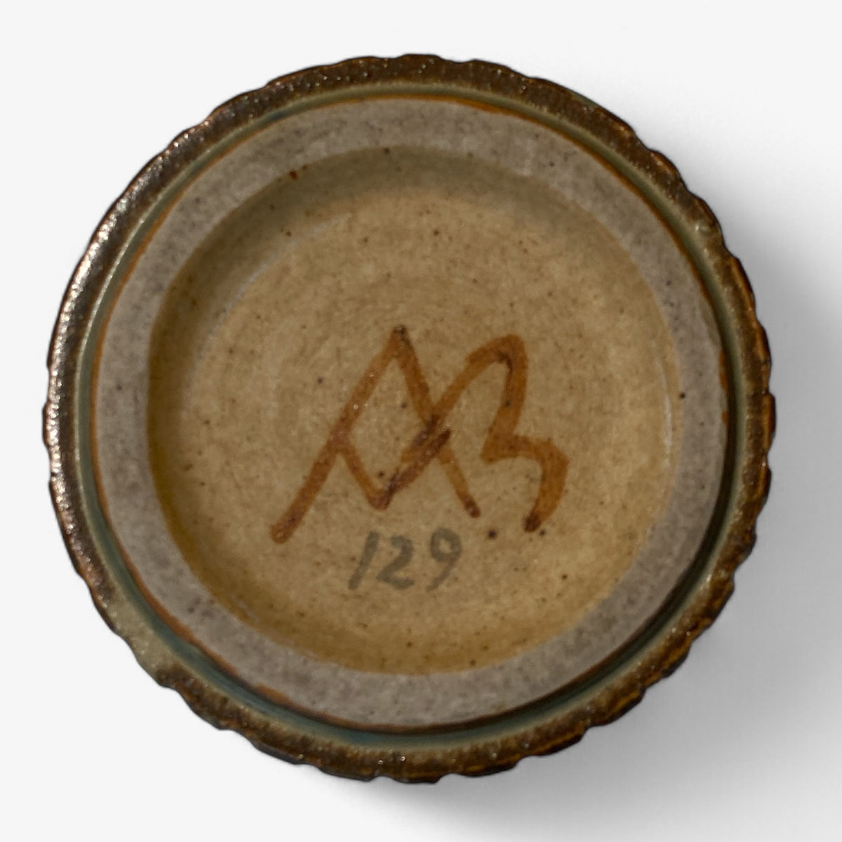 Lidded jar in fluted stoneware