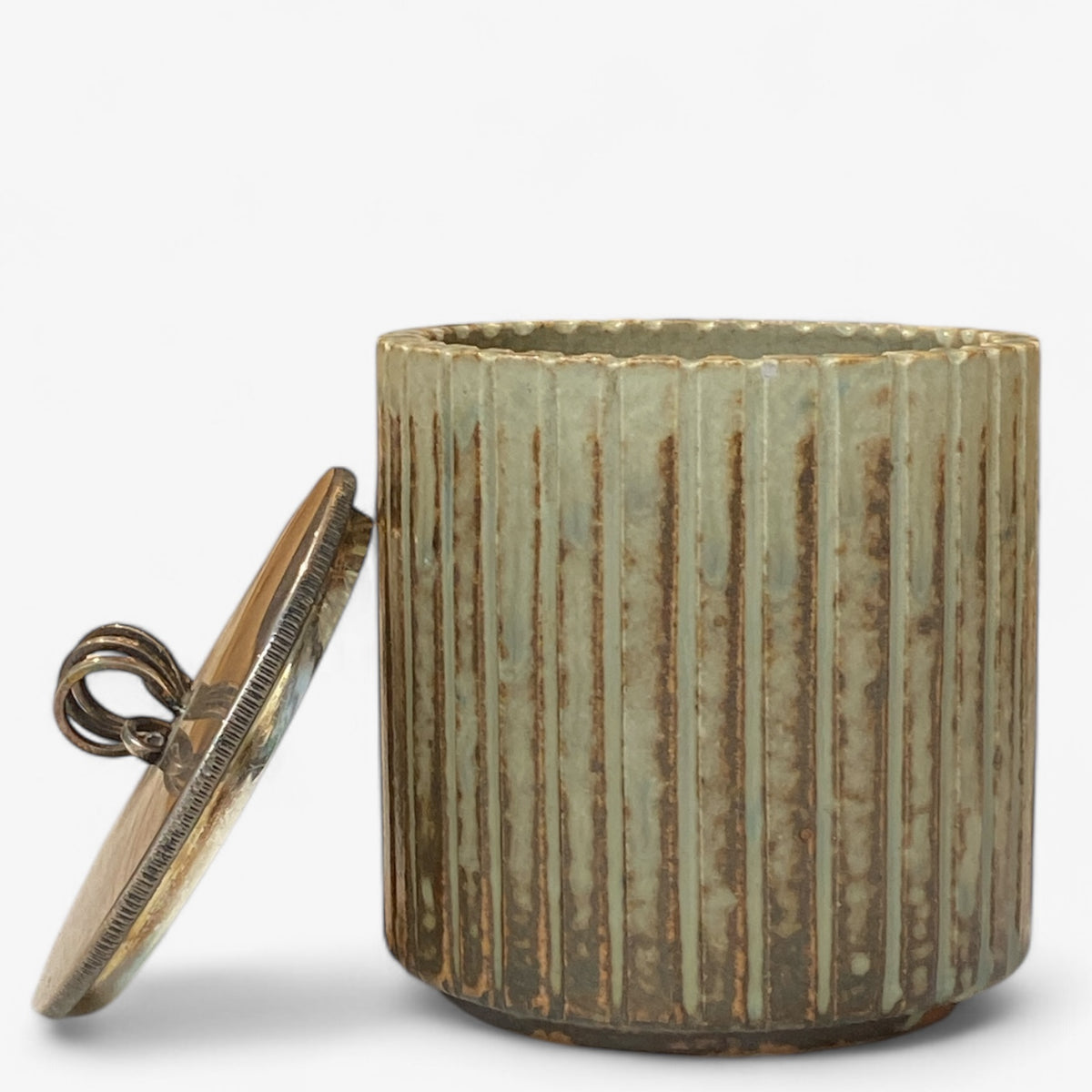 Lidded jar in fluted stoneware