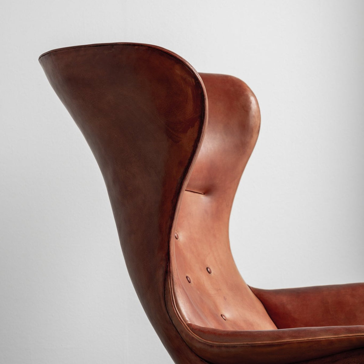 A pair of rare 'Wingback' armchairs