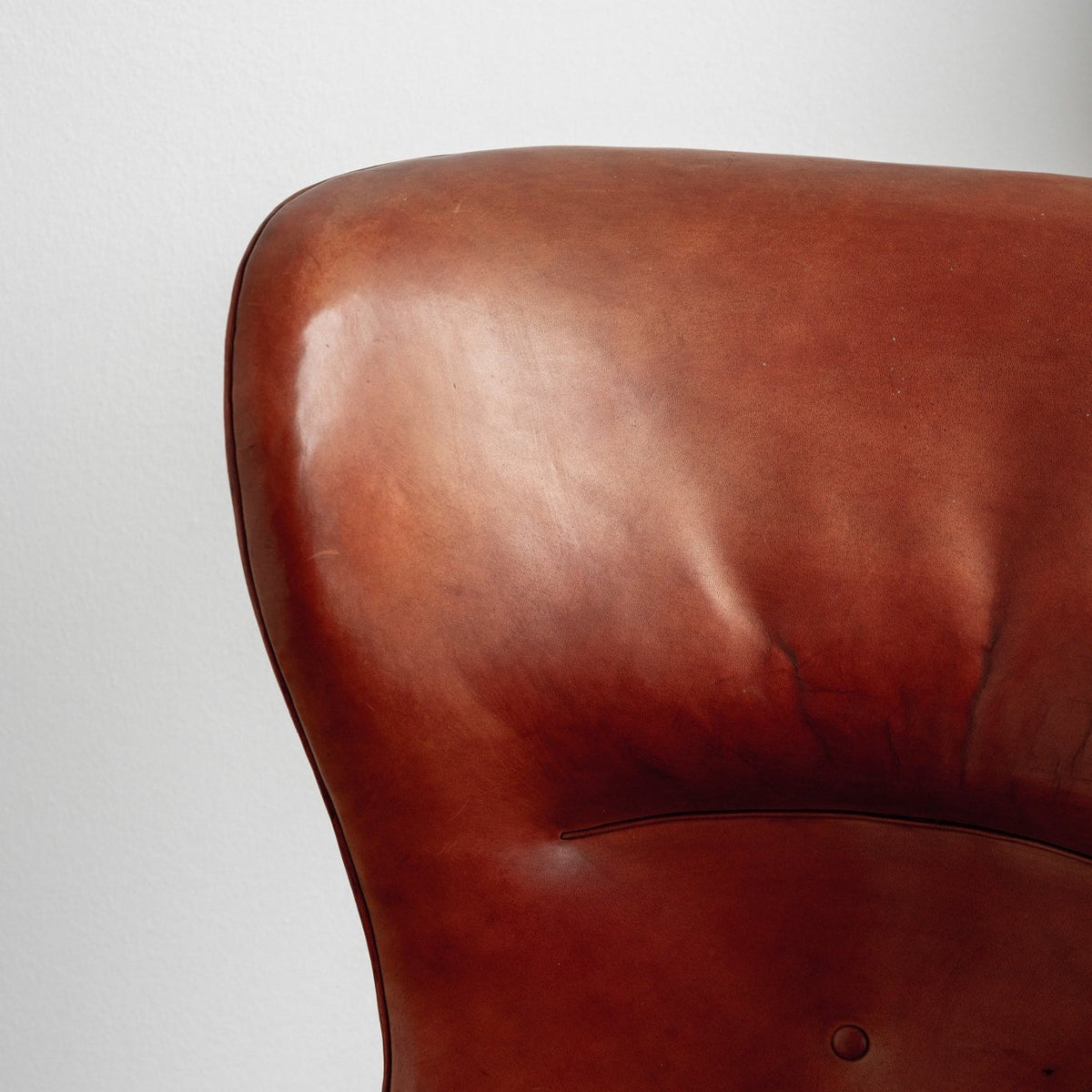 A pair of rare 'Wingback' armchairs