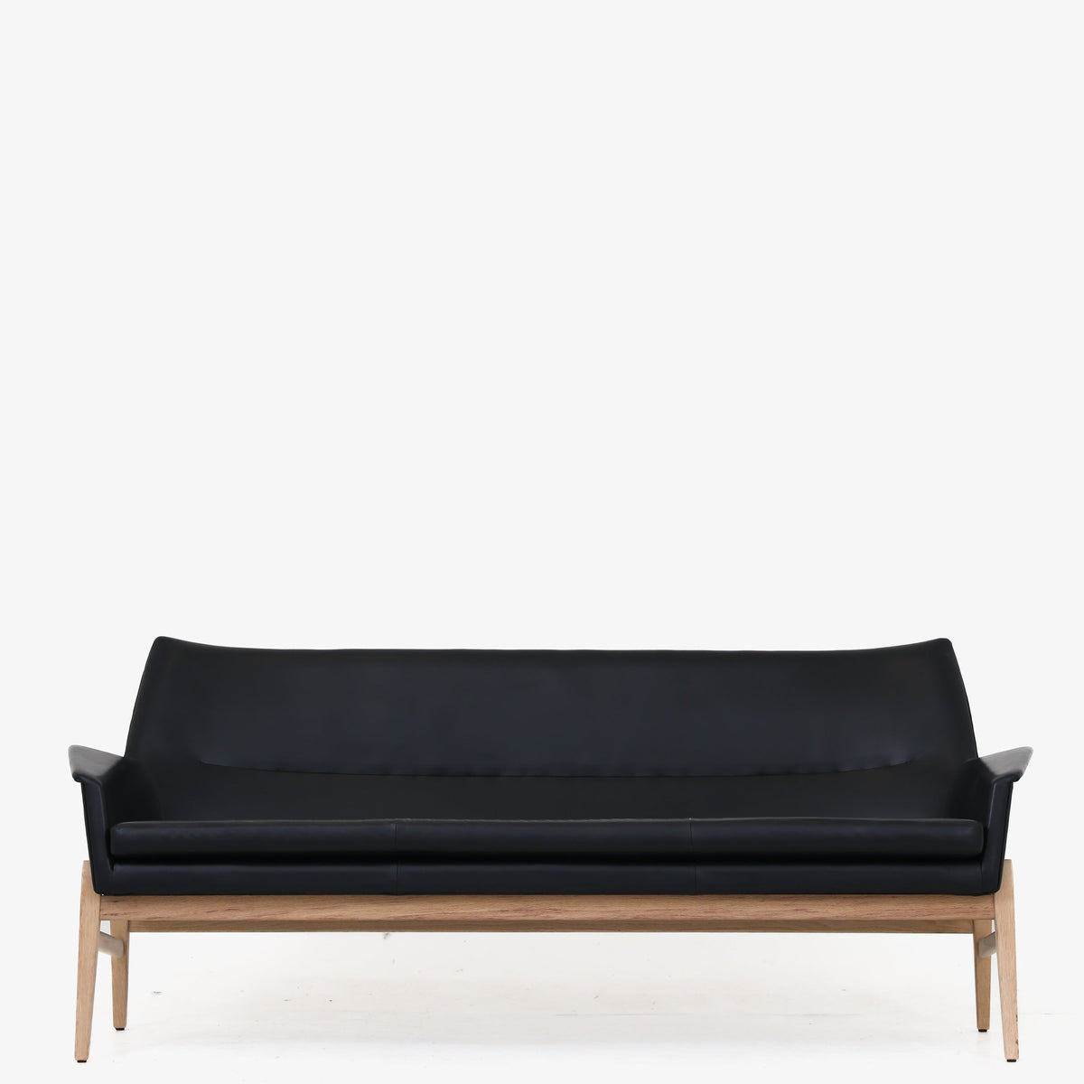 Wing' sofa in black leather
