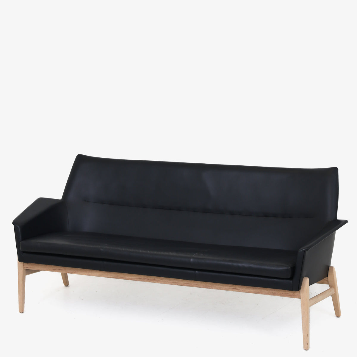 Wing' sofa in black leather