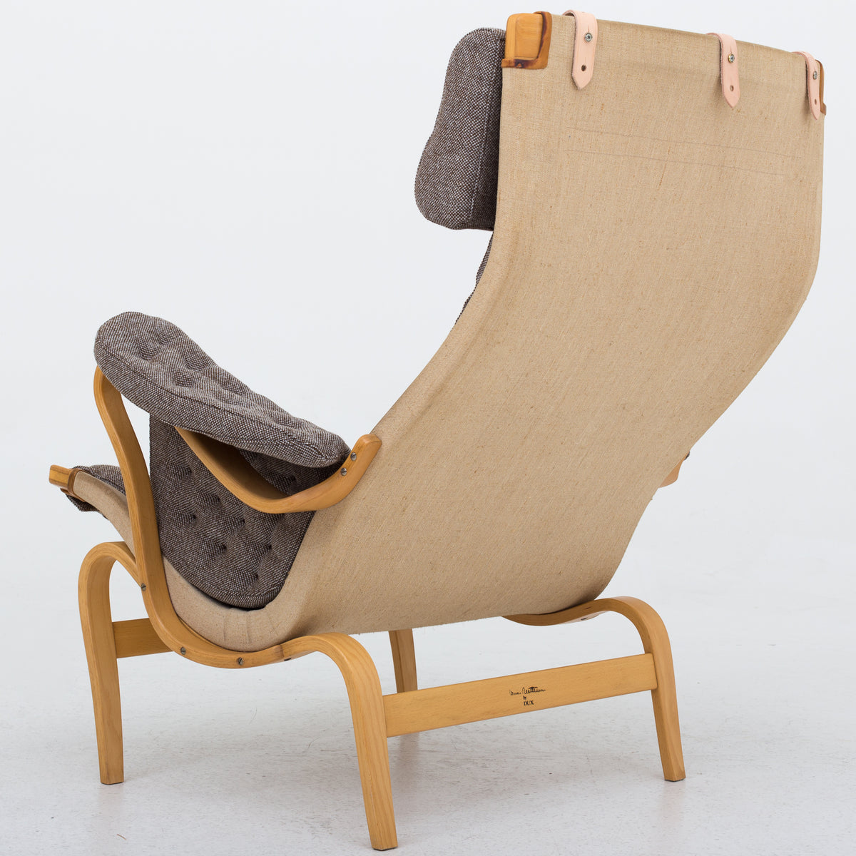 Pernilla 69 - Easy chair in new textile