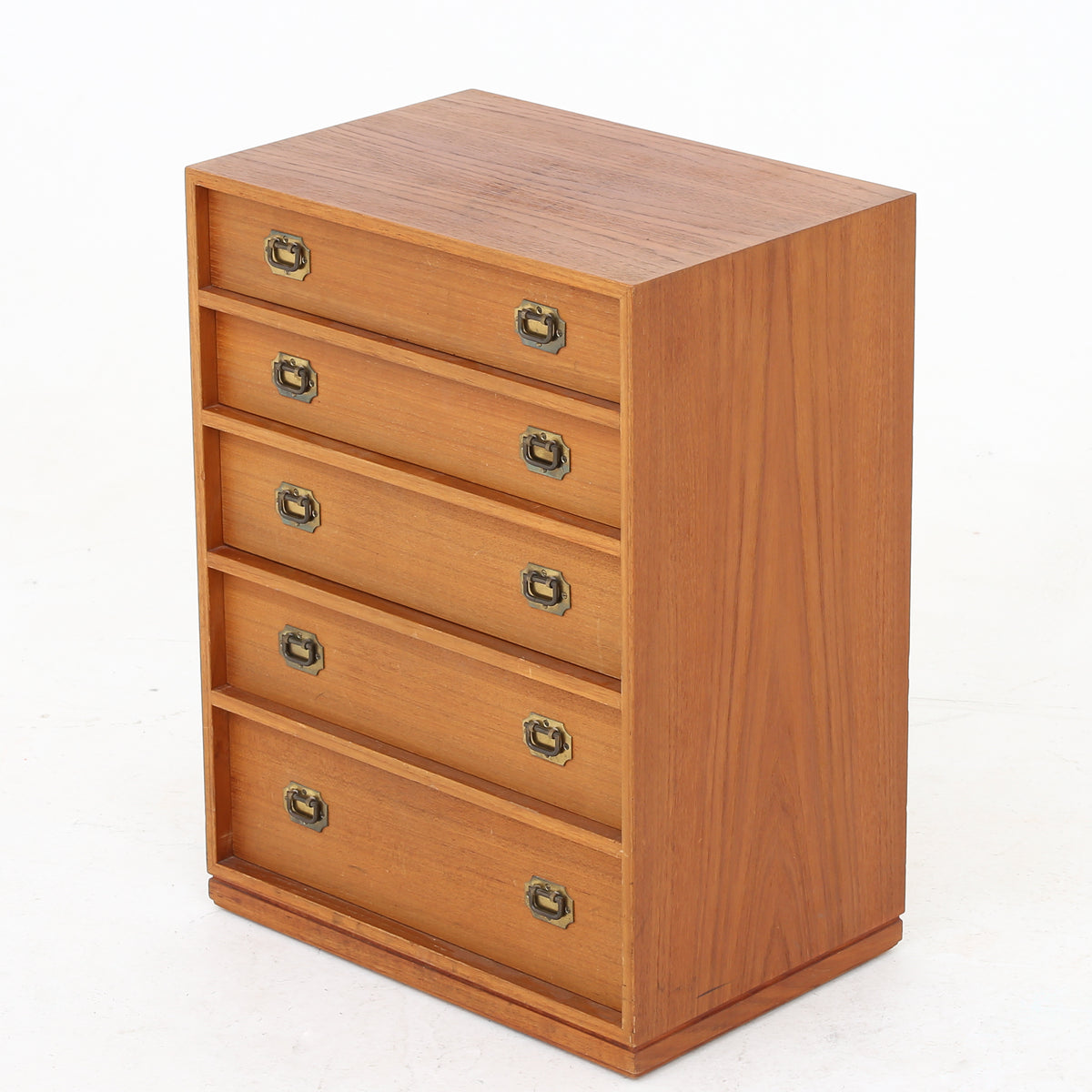 Small teak chest of drawers