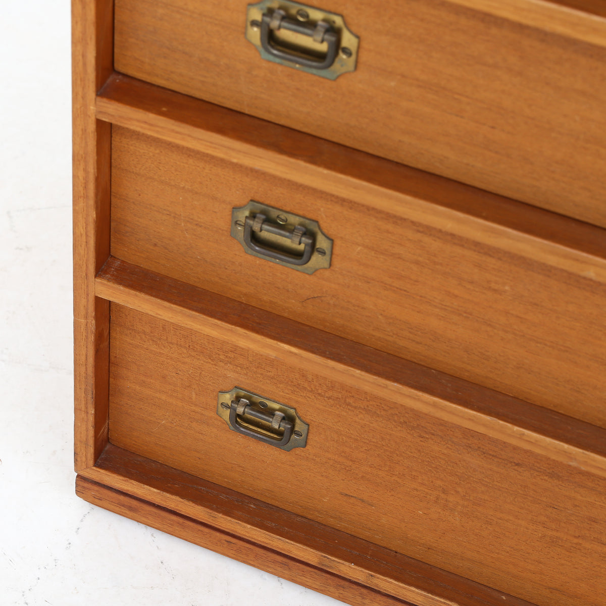 Small teak chest of drawers