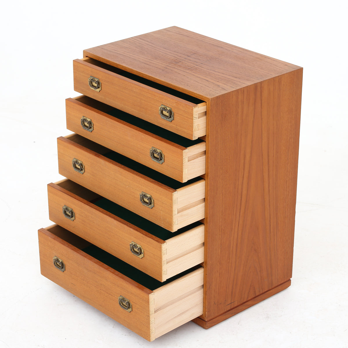 Small teak chest of drawers
