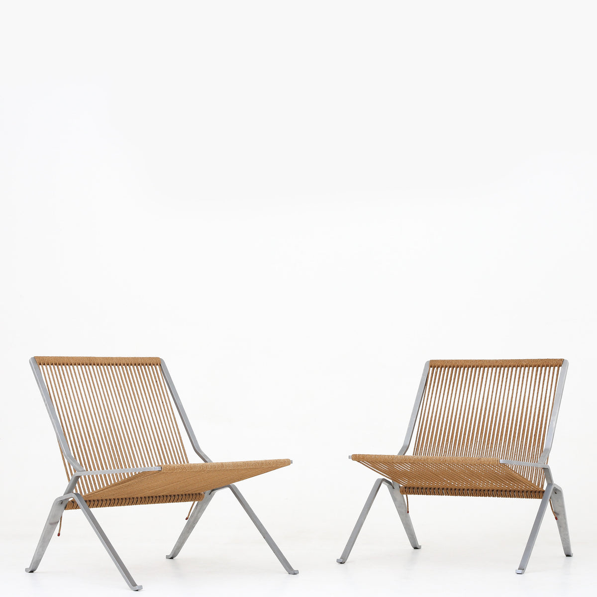 PK 25 - Pair of rare easy chairs