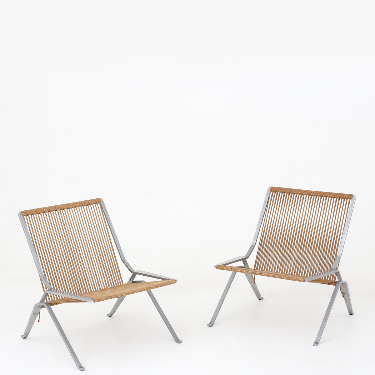 PK 25 - Pair of rare easy chairs