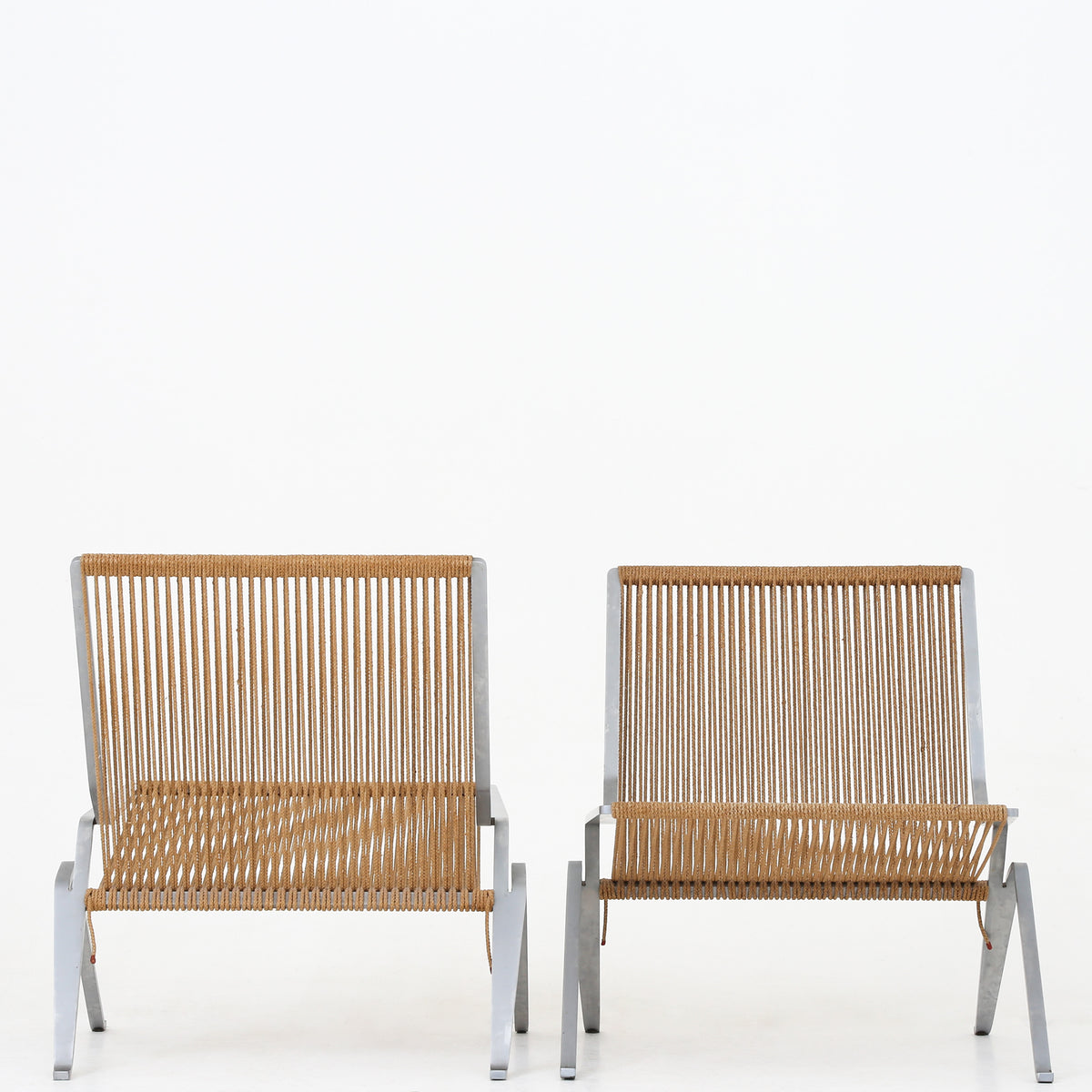 PK 25 - Pair of rare easy chairs